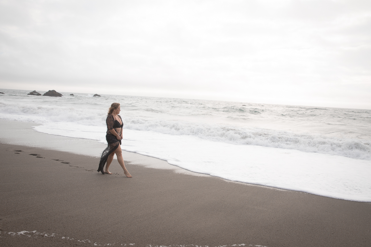 woman walking on beach