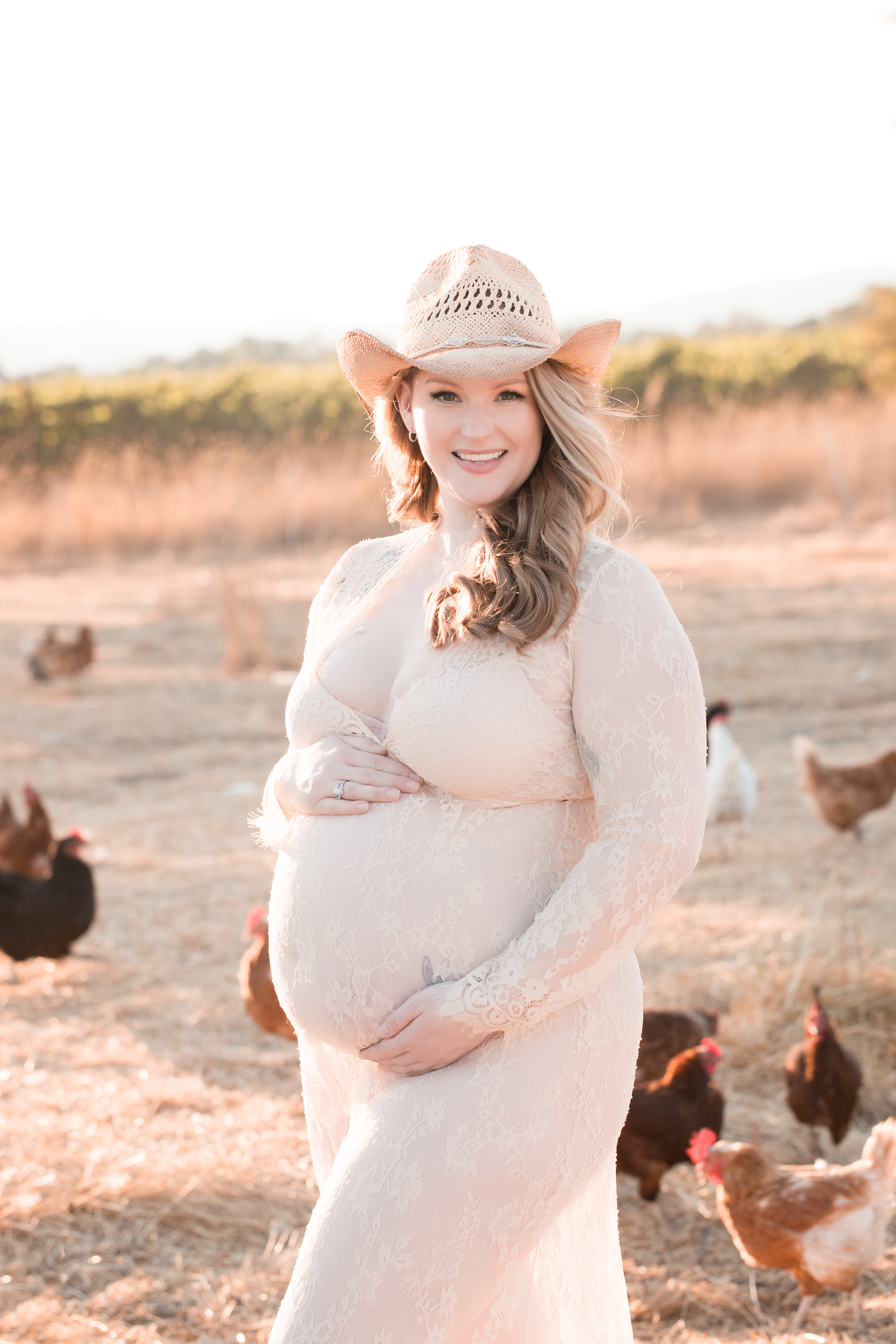 pregnant woman with chickens